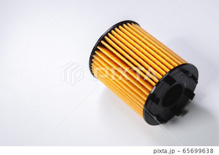 Paper plastic filtering element liner to filter oil new on gray gradient background 65699638
