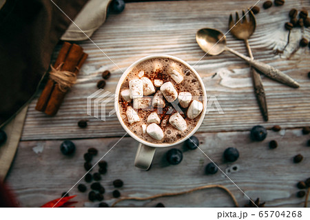 Appetizing sweet coffee with marshmallows  65704268
