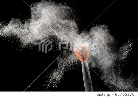 A brush with  white powder impact to make a  white cloud. 65705270