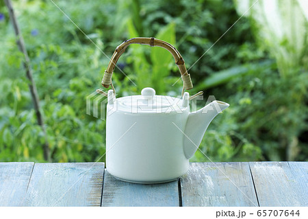 White Teapot on table White Teapot on table 65707644