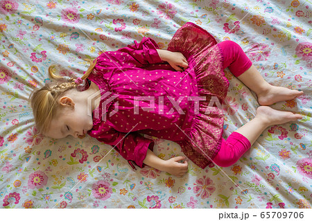 Cute little sleeping girl on the bed. Cute little sleeping girl on the bed. 65709706