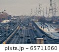 Broadband big highway in the winter. High-voltage towers along the road. 65711660