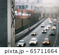 urban graffiti on the background of blurred car traffic in the background 65711664