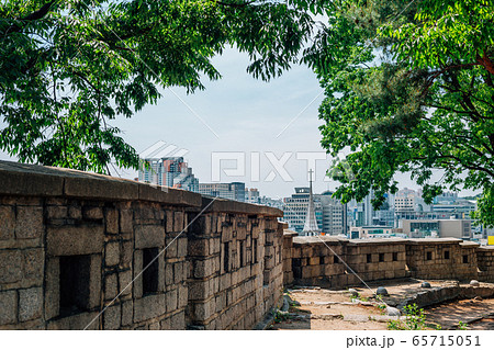 Naksan fortress wall road and Seoul cityscape in Seoul, Korea Naksan fortress wall road and Seoul cityscape in Seoul, Korea 65715051