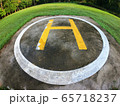 Closeup of helipad for landing helicopters on asphalt ground 65718237