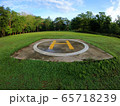 Closeup of helipad for landing helicopters on asphalt ground 65718239