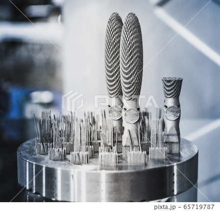 Object printed on metal 3d printer close-up Object printed on metal 3d printer close-up 65719787