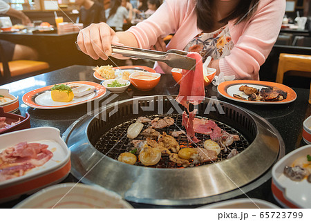 Raw beef and pork slice on grille for barbecue or Raw beef and pork slice on grille for barbecue or 65723799