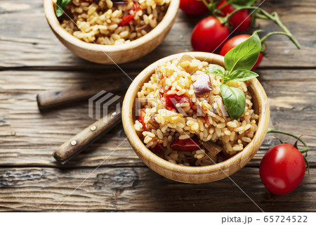 Vegetaian rice with onion, tomato and eggplant Vegetaian rice with onion, tomato and eggplant 65724522