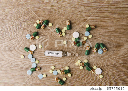 Coronavirus.Covid-19.Ampoule with the inscription 65725012