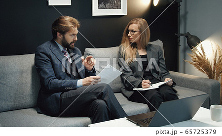 Two business people discussing ideas Two business people discussing ideas 65725379