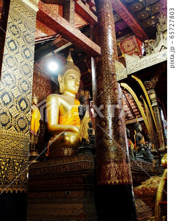 Decorative elements with meaningful buddhism ornaments in WAT XIENG THONG: the famous outstanding beautiful XIENGTHONG Temple in LUANG PRABANG province ex-capital city world cultural heritage in LAOS  65727803