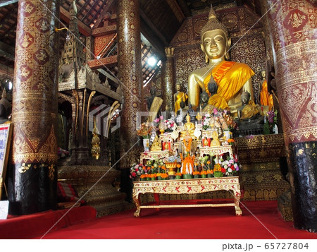 Decorative elements with meaningful buddhism ornaments in WAT XIENG THONG: the famous outstanding beautiful XIENGTHONG Temple in LUANG PRABANG province ex-capital city world cultural heritage in LAOS  65727804