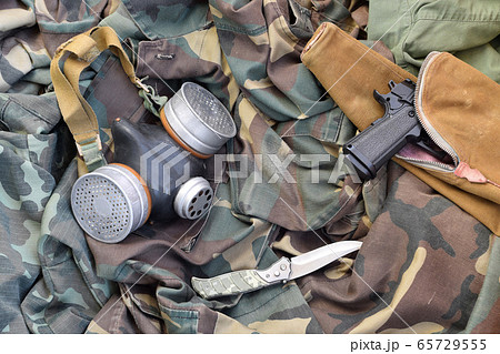 Stalker soldiers soviet gas mask lies with handgun Stalker soldiers soviet gas mask lies with handgun 65729555