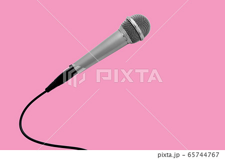 Microphone with copy space on pink background 65744767