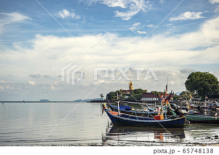 Fishing boats on the shore at low tide . Thailand Fishing boats on the shore at low tide . Thailand 65748138