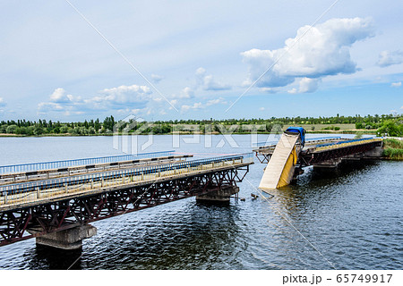 Destruction of bridge structures across the river Destruction of bridge structures across the river 65749917