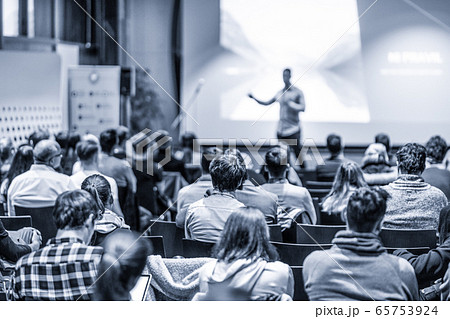 Male public peaker giving presentation on business conference event. Male public peaker giving presentation on business conference event. 65753924