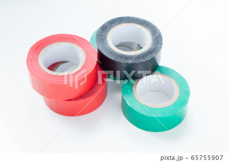 Multicolored duct tape rolls on white background. 65755907