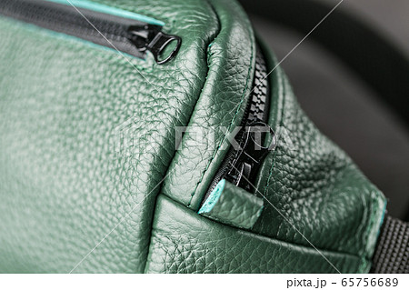 Belt bag made of dark green textured leather, 65756689