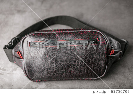 Bag on the belt of textured leather in Bordeaux Bag on the belt of textured leather in Bordeaux 65756705