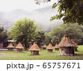 Mountain morning misty landscape with an apiary 65757671