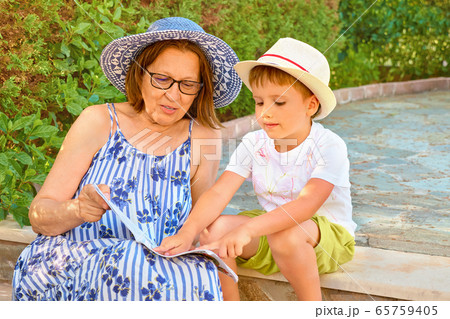 Boy studying with tutor. Home schooling concept. Boy studying with tutor. Home schooling concept. 65759405