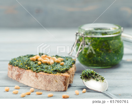 whole grain rye bread with fresh pesto 65760761