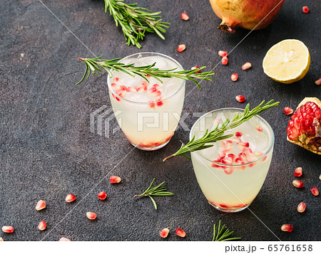 white sangria with rosemary, pomegrante and lemon juice 65761658