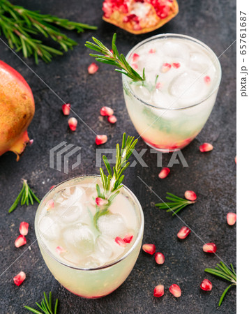 white sangria with rosemary, pomegrante and lemon juice white sangria with rosemary, pomegrante and lemon juice 65761687