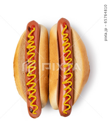 Hot dog with ketchup and mustard on white Hot dog with ketchup and mustard on white 65764810