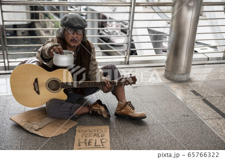 Old beggar ask for money after play guitar Old beggar ask for money after play guitar 65766322