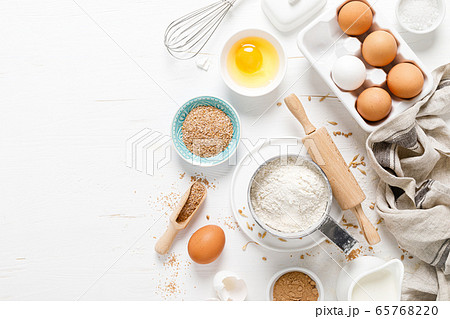 Baking homemade bread on white kitchen worktop 65768220