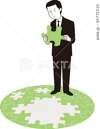 パズルのピースを持つ男性ビジネスマン パズルのピースを持つ男性ビジネスマン 65775510