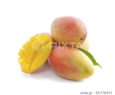 Mango fruit with mango cubes and slices an Mango fruit with mango cubes and slices an 65776455
