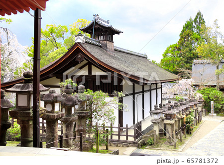 Ancient pavilion and stone lanterns at Kasuga Ancient pavilion and stone lanterns at Kasuga 65781372