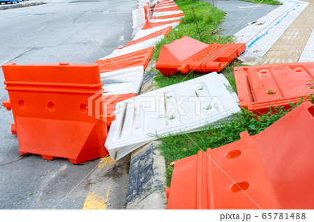 Plastic blocks restricting the passage of cars Plastic blocks restricting the passage of cars 65781488