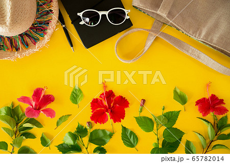 Beach accessories For the traveler on the yellow background - sunglasses, backpack. summer   65782014