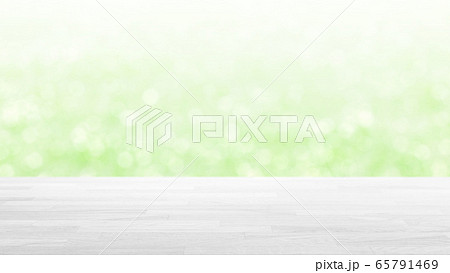 白木の木目テーブルとボケのグリーンの背景 16 9のイラスト素材