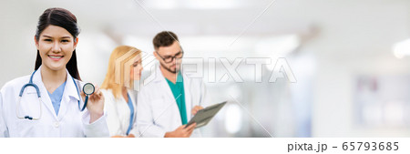 Doctor working in hospital with other doctors. Doctor working in hospital with other doctors. 65793685