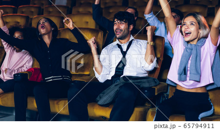 Audience is happy and exciting in movie theater 65794911