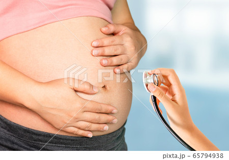 Pregnant Woman and Gynecologist Doctor at Hospital Pregnant Woman and Gynecologist Doctor at Hospital 65794938