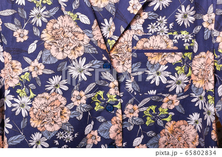 Close-up detail and fabric texture of a pajama. Homewear, sleepwear, shopping and sale concept. Close-up detail and fabric texture of a pajama. Homewear, sleepwear, shopping and sale concept. 65802834