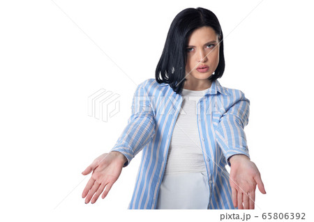 Portrait of smiling young woman gesturing isolated Portrait of smiling young woman gesturing isolated 65806392