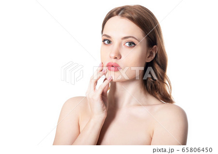 Beautiful young woman with perfect skin isolated on white background Beautiful young woman with perfect skin isolated on white background 65806450