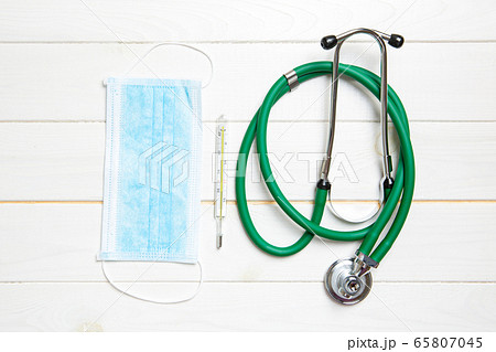 Top view of stethoscope, protective mask and 65807045