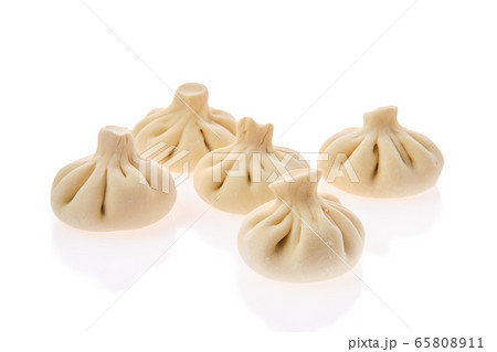 Uncooked khinkali isolated on white background Uncooked khinkali isolated on white background 65808911