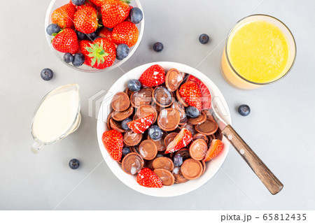 Trendy small chocolate cereal pancakes Trendy small chocolate cereal pancakes 65812435