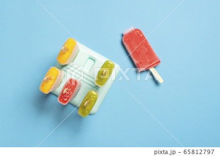 Strawberry ice cream in the popsicle mold. 65812797