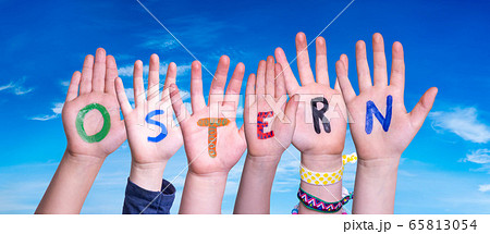 Children Hands Building Word Ostern Means Easter, 65813054
